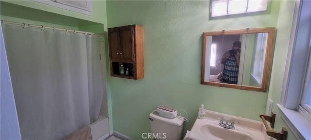 5914 N Rockvale Ave, Azusa, CA 91702 - full bath with a sink, toilet, healthy amount of natural light, and shower / bath combination with curtain