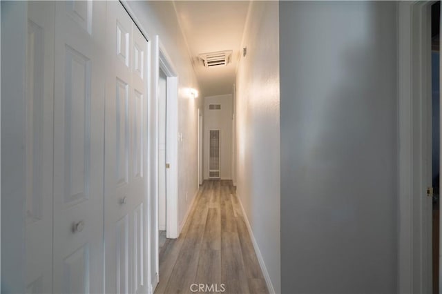 5914 N Rockvale Ave, Azusa, CA 91702 - hallway with light wood finished floors and baseboards