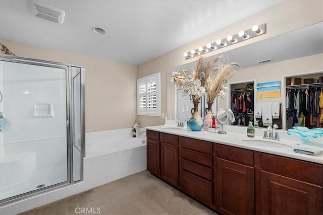27109 Woodglen Ln, Moreno Valley, CA 92555 - bathroom with a stall shower, a bath, double vanity, and a walk in closet