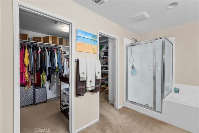 27109 Woodglen Ln, Moreno Valley, CA 92555 - bathroom featuring a stall shower, a garden tub, and a walk in closet