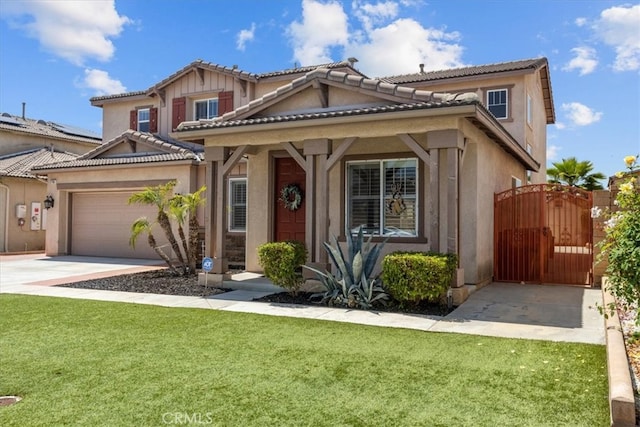 27109 Woodglen Ln, Moreno Valley, CA 92555 - view of front of home with concrete driveway, a tile roof, an attached garage, a gate, and a front yard