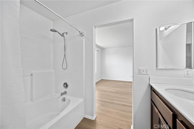 1349 Gordon Ct, Beaumont, CA 92223 - bathroom with vanity, shower / tub combination, wood finished floors, and baseboards