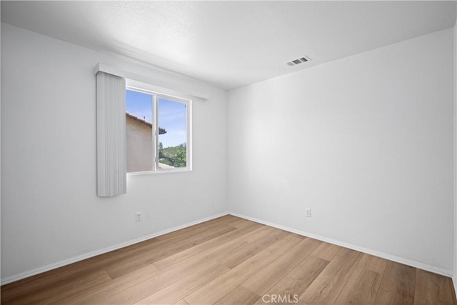 1349 Gordon Ct, Beaumont, CA 92223 - empty room with wood finished floors and baseboards