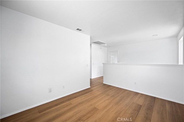 1349 Gordon Ct, Beaumont, CA 92223 - empty room with wood finished floors and baseboards