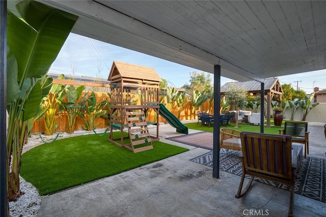 16782 Heritage Ln, Huntington Beach, CA 92647 - view of patio featuring a playground and an outdoor living space