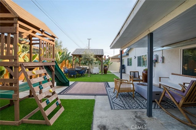 16782 Heritage Ln, Huntington Beach, CA 92647 - view of yard featuring an outdoor fire pit, a patio, and a gazebo