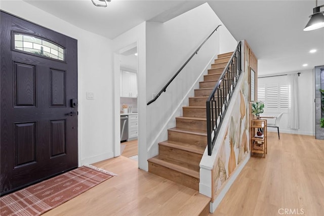 16782 Heritage Ln, Huntington Beach, CA 92647 - entrance foyer featuring light wood-style floors, stairway, baseboards, and recessed lighting