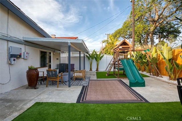 16782 Heritage Ln, Huntington Beach, CA 92647 - view of patio featuring a playground and central air condition unit
