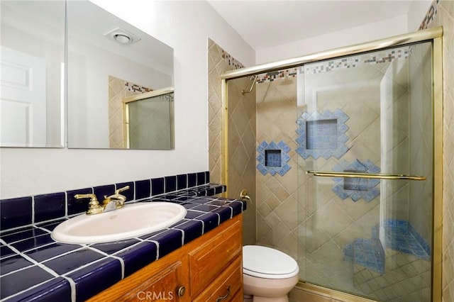 43334 32nd St W Unit 12, Lancaster, CA 93536 - full bathroom featuring vanity, a stall shower, and toilet