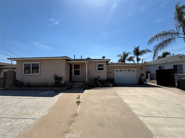 678 Ash Ave, Chula Vista, CA 91910 - single story home with stucco siding, an attached garage, and driveway