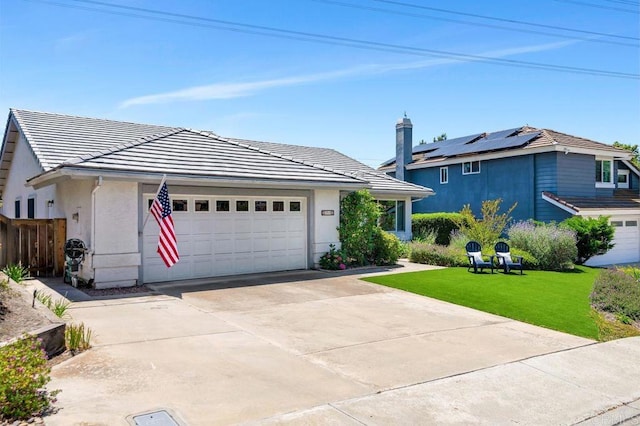 1064 Glen Arbor Dr, Encinitas, CA 92024 - view of front facade featuring concrete driveway, an attached garage, a tile roof, and stucco siding
