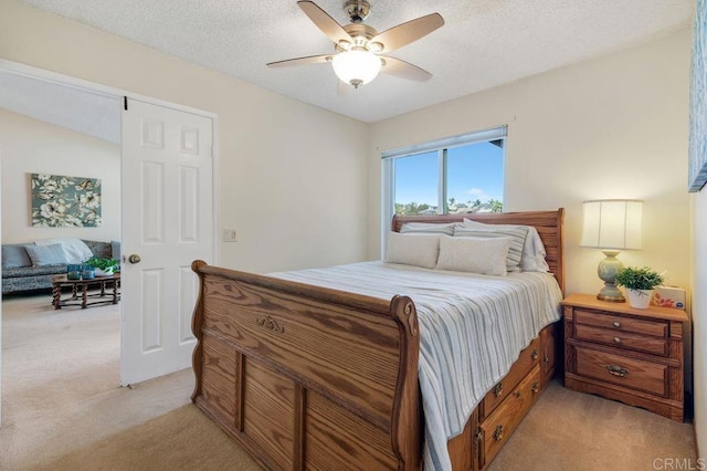 1064 Glen Arbor Dr, Encinitas, CA 92024 - bedroom featuring light carpet, ceiling fan, and a textured ceiling