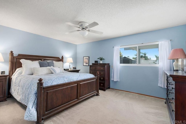 1064 Glen Arbor Dr, Encinitas, CA 92024 - bedroom with light colored carpet, ceiling fan, a textured ceiling, and baseboards