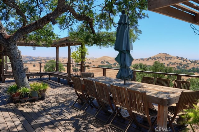 2380 Old Hwy, Catheys Valley, CA 95306 - wooden deck featuring a mountain view and outdoor dining space