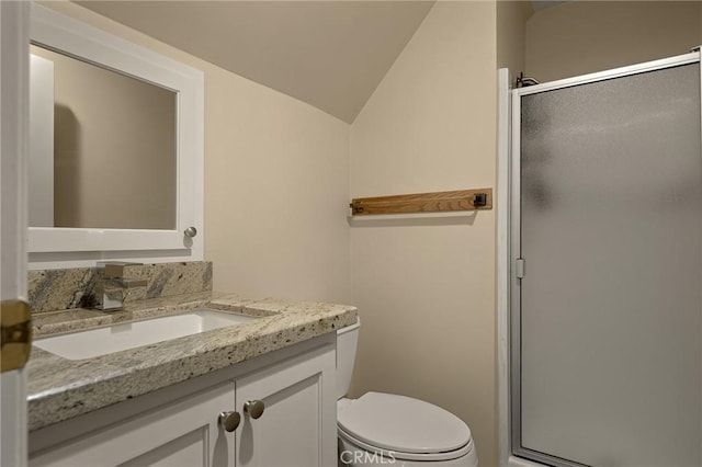 28960 Palisades Dr, Lake Arrowhead, CA 92352 - full bathroom featuring a stall shower, vanity, lofted ceiling, and toilet