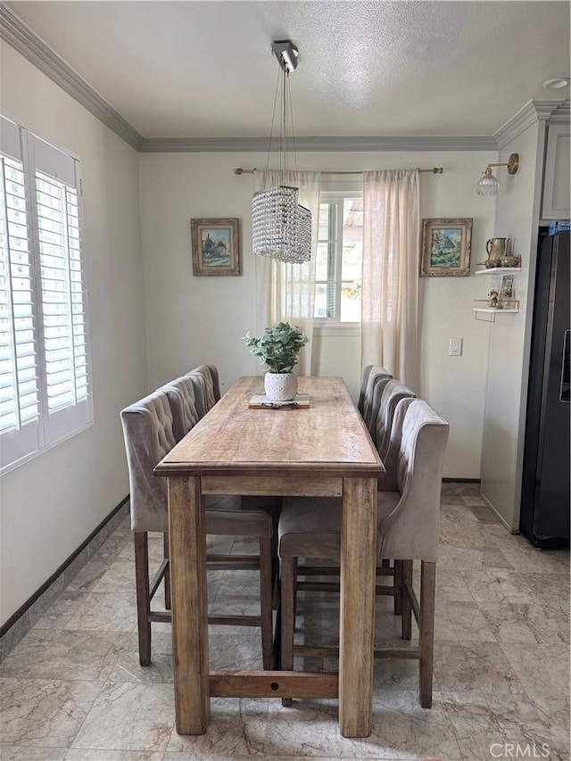 4552 Los Toros Ave, Pico Rivera, CA 90660 - dining room with ornamental molding, a chandelier, and baseboards