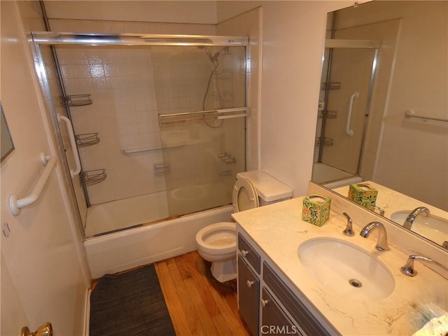 3513 Alma Ave, Manhattan Beach, CA 90266 - full bath featuring toilet, wood finished floors, vanity, and shower / bath combination with glass door