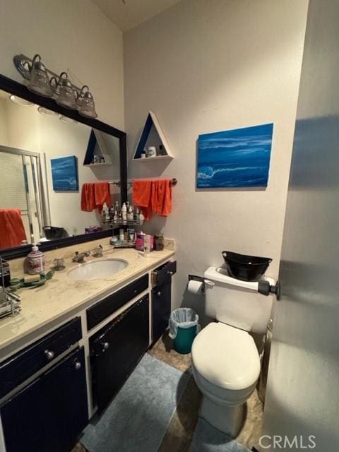 3513 Alma Ave, Manhattan Beach, CA 90266 - bathroom featuring vanity, toilet, and a stall shower