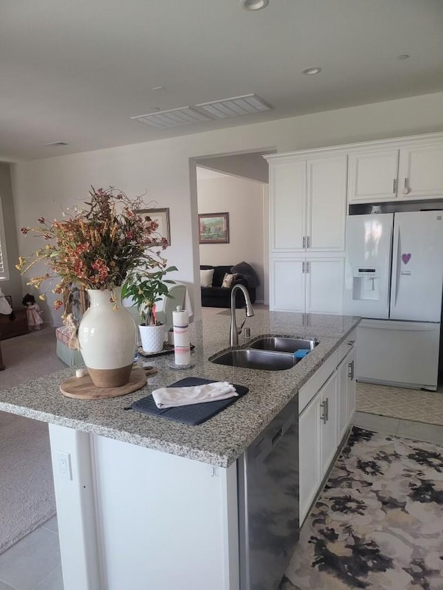 11915 Sagecrest Ct, Corona, CA 92883 - kitchen with white refrigerator with ice dispenser, a sink, dishwasher, white cabinets, and light stone counters