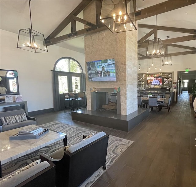 11915 Sagecrest Ct, Corona, CA 92883 - living area featuring a chandelier, high vaulted ceiling, beamed ceiling, wood finished floors, and a multi sided fireplace
