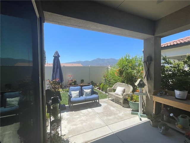 11915 Sagecrest Ct, Corona, CA 92883 - view of patio featuring an outdoor hangout area and a mountain view