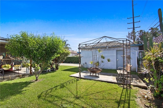 338 W Glencoe St, Compton, CA 90220 - view of yard featuring a fire pit and a patio