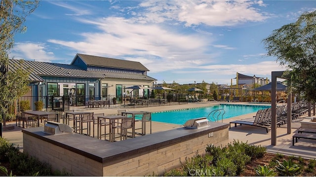 2557 E Hyde Paseo, Ontario, CA 91762 - community pool with area for grilling and a patio