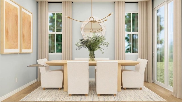 2557 E Hyde Paseo, Ontario, CA 91762 - dining area featuring light wood-style floors and baseboards