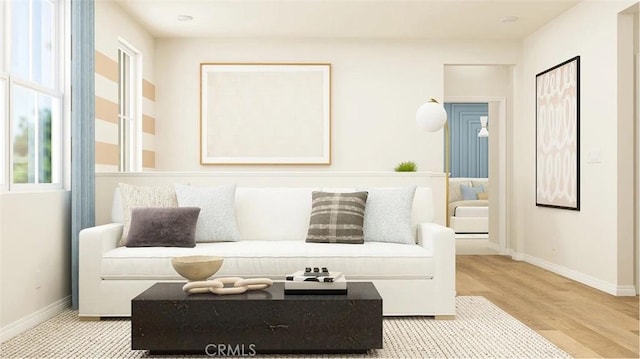 2557 E Hyde Paseo, Ontario, CA 91762 - living room with baseboards and wood finished floors