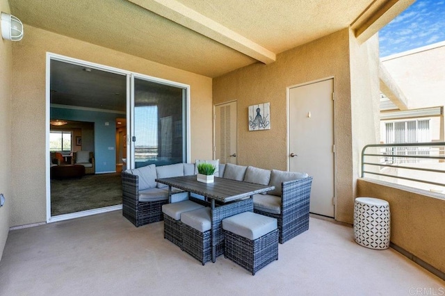 4021 Canario St Unit 235, Carlsbad, CA 92008 - view of patio featuring a balcony and outdoor dining area
