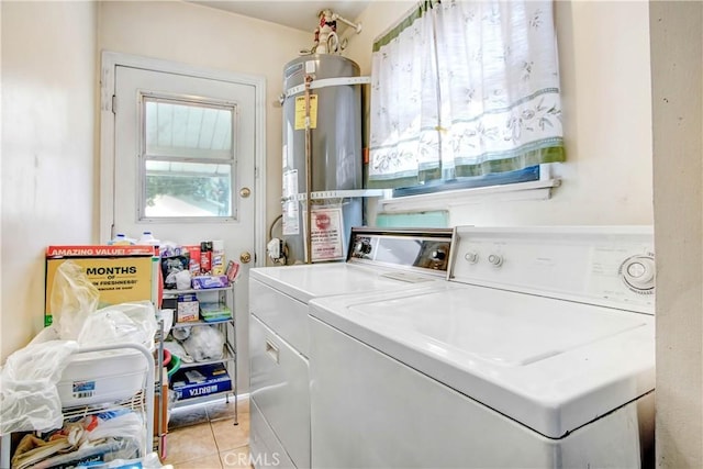18003 Saticoy St, Reseda, CA 91335 - laundry room featuring water heater, separate washer and dryer, and light tile patterned floors