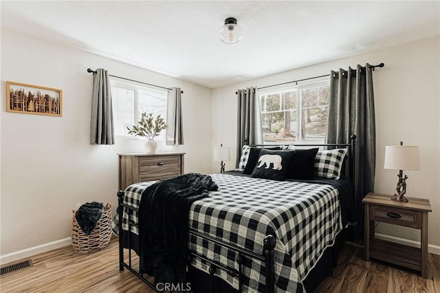 26625 Pinehurst Dr, Lake Arrowhead, CA 92352 - bedroom featuring baseboards and wood finished floors