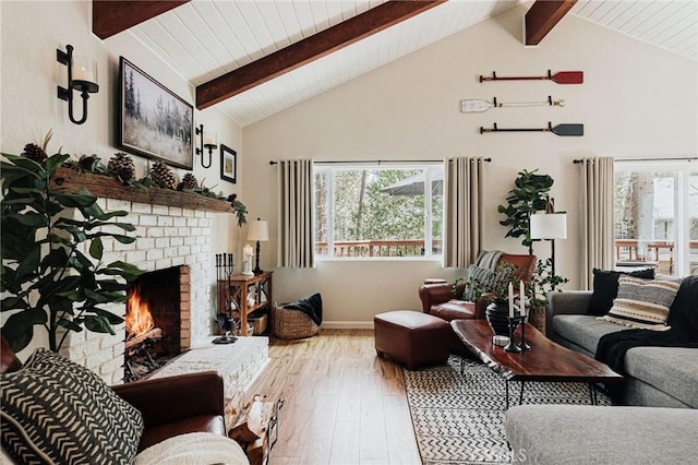 26625 Pinehurst Dr, Lake Arrowhead, CA 92352 - living area with hardwood / wood-style floors, a brick fireplace, wooden ceiling with exposed beams, and high vaulted ceiling
