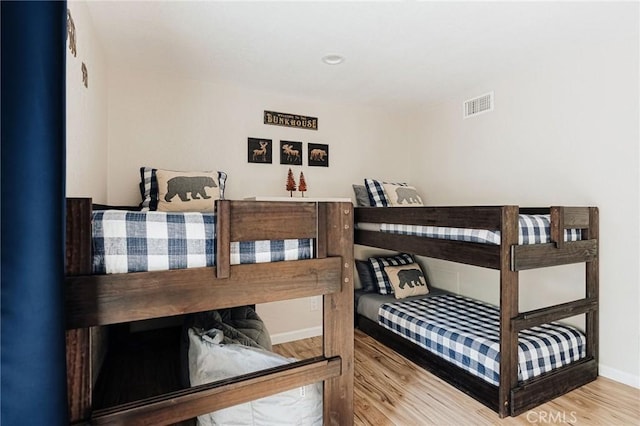 26625 Pinehurst Dr, Lake Arrowhead, CA 92352 - bedroom featuring wood finished floors and baseboards