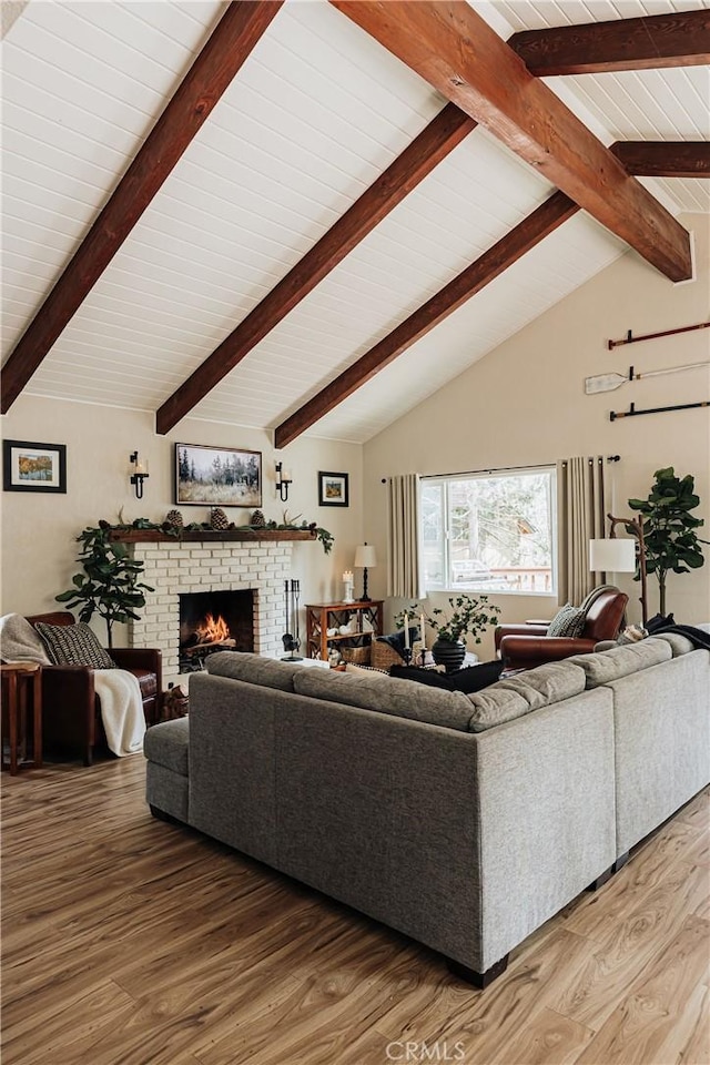 26625 Pinehurst Dr, Lake Arrowhead, CA 92352 - living room with light wood-style floors and a fireplace