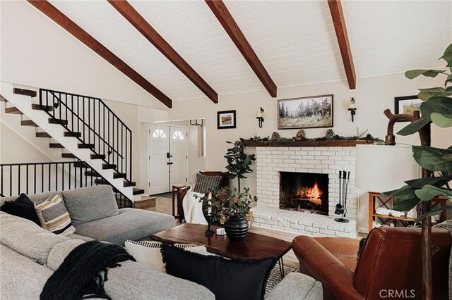 26625 Pinehurst Dr, Lake Arrowhead, CA 92352 - living room with stairway, wood finished floors, and a fireplace