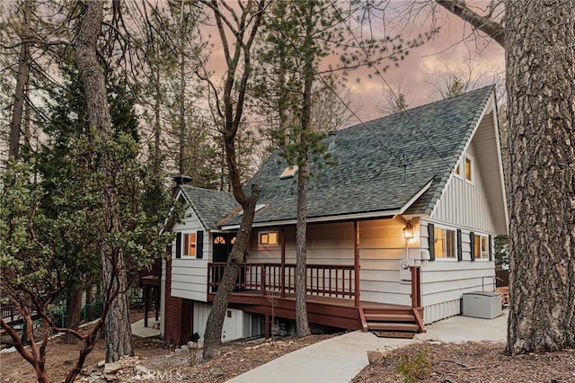 26625 Pinehurst Dr, Lake Arrowhead, CA 92352 - rear view of property featuring roof with shingles and a deck