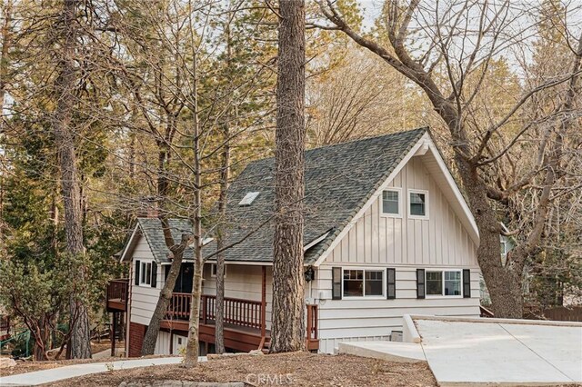 26625 Pinehurst Dr, Lake Arrowhead, CA 92352 - view of front of property featuring roof with shingles and board and batten siding