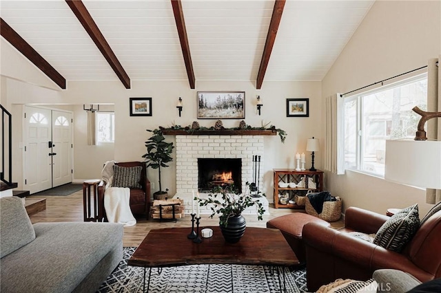 26625 Pinehurst Dr, Lake Arrowhead, CA 92352 - living area with wood finished floors, a brick fireplace, and baseboards