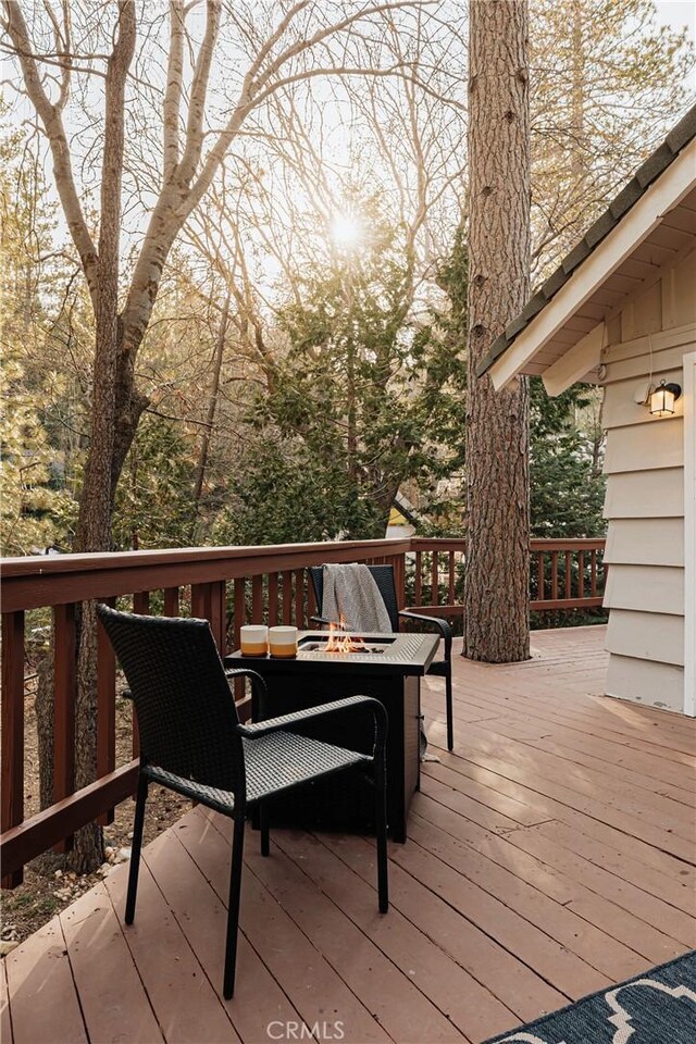 26625 Pinehurst Dr, Lake Arrowhead, CA 92352 - deck featuring an outdoor fire pit