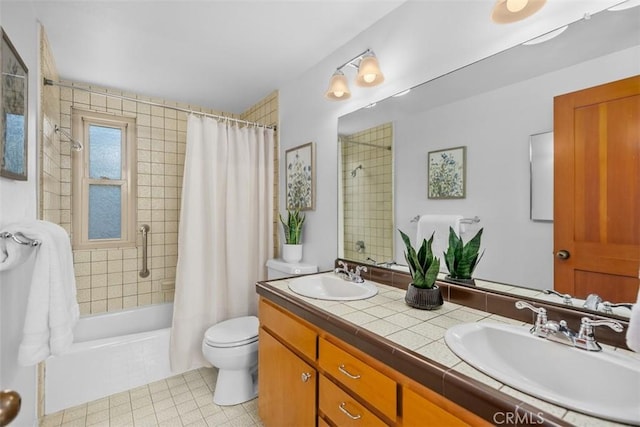 23442 Via Codorniz, Coto De Caza, CA 92679 - full bathroom with double vanity, shower / bath combination with curtain, toilet, and tile patterned floors