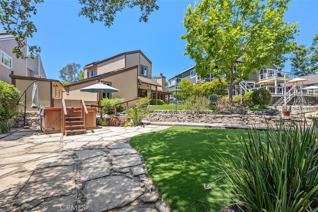 23442 Via Codorniz, Coto De Caza, CA 92679 - view of yard featuring a hot tub and a patio area