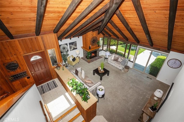 23442 Via Codorniz, Coto De Caza, CA 92679 - living room featuring wooden ceiling, wood walls, and a fireplace
