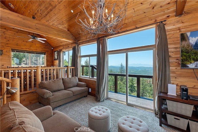 175 N Trails End Rd, Green Valley Lake, CA 92341 - living area with wood walls, a chandelier, carpet flooring, wooden ceiling, and a ceiling fan