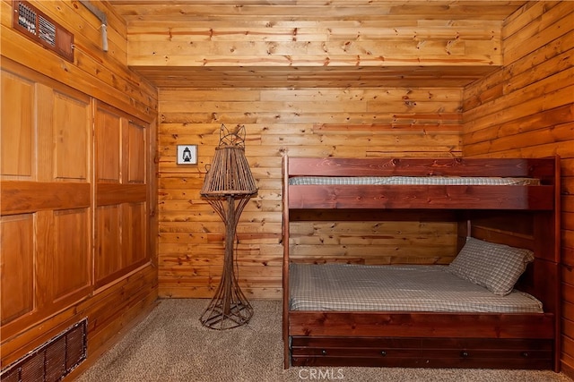 175 N Trails End Rd, Green Valley Lake, CA 92341 - unfurnished bedroom featuring carpet floors, wood walls, and wooden ceiling