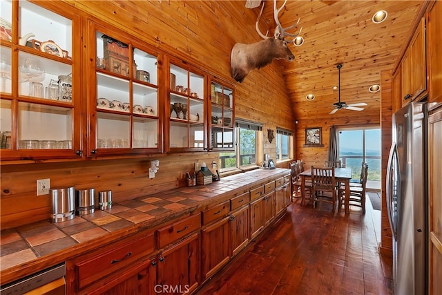 175 N Trails End Rd, Green Valley Lake, CA 92341 - kitchen with tile counters, freestanding refrigerator, healthy amount of natural light, dark wood finished floors, and wood ceiling