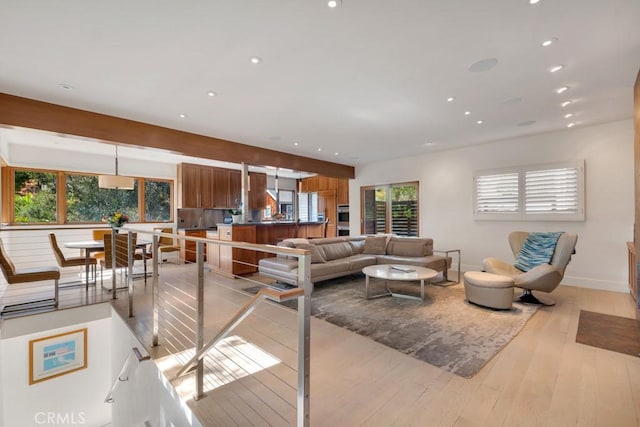 4315 Morro Dr, Woodland Hills, CA 91364 - living area with light wood finished floors, recessed lighting, and baseboards