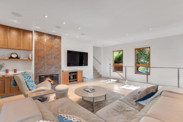 4315 Morro Dr, Woodland Hills, CA 91364 - living room featuring recessed lighting, a tile fireplace, and stairway