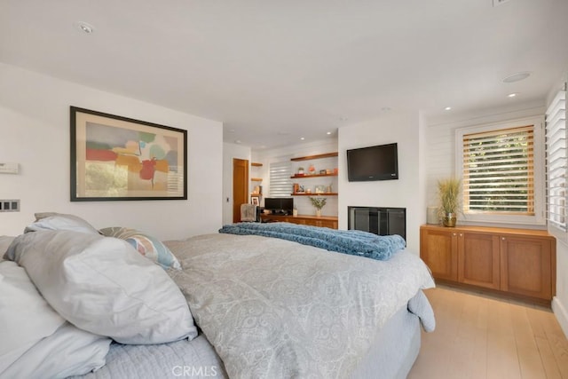 4315 Morro Dr, Woodland Hills, CA 91364 - bedroom with light wood finished floors and recessed lighting
