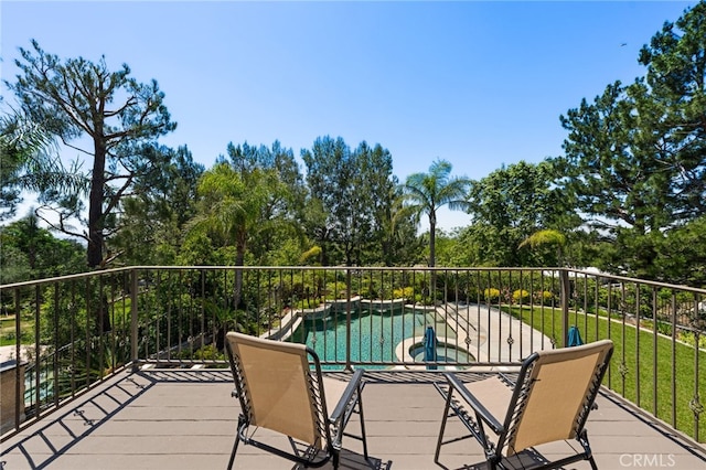 12719 E Rancho Estates Pl, Rancho Cucamonga, CA 91739 - wooden deck with a pool with connected hot tub and view of wooded area